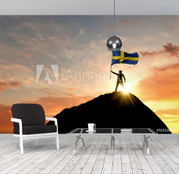 Picture of Sweden flag being waved at the top of a mountain summit 3D Rendering